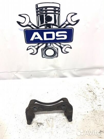 Скоба суппорта передняя Ssangyong Kyron 1 D20DT