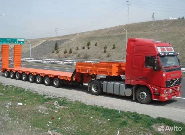 Водители низкорамного трала и самосвала