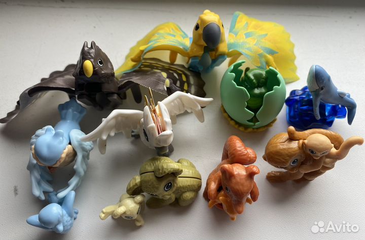 Игрушки киндер сюрприз звери и птицы с вкладишами