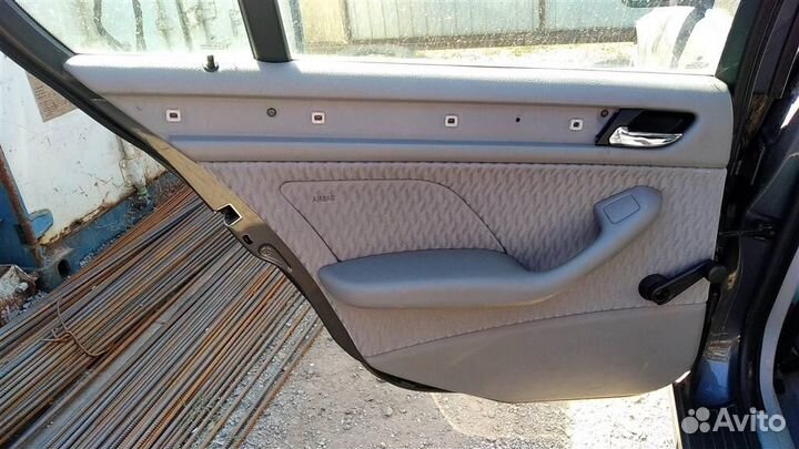 Обшивка двери км-т (карты) BMW 3 Е46 98-05г