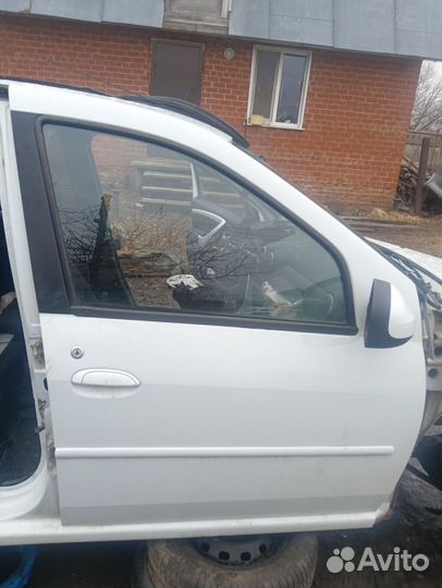 Двери передние Renault Logan 2013