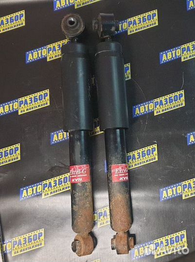 Амортизатор задний Опель Астра Н