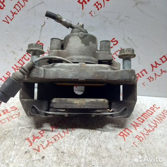 Суппорт тормозной передний левый Volkswagen Touran