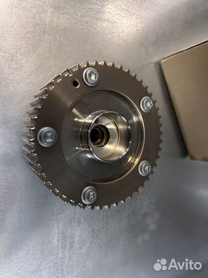 Регулятор фаз газораспределения 04Е109088ае