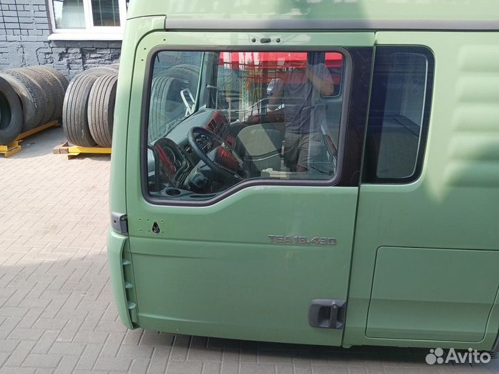 Дверь левая Man TGA