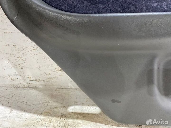 Обшивка боковой двери задняя левая Kia Spectra