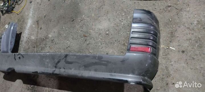 Бампер задний Nissan Elgrand E50