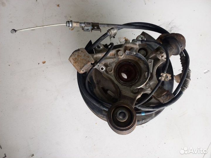 Кулак поворотный задний левый Mitsubishi Pajero