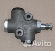 Клапан ограничительный опрокидывающего механизма с