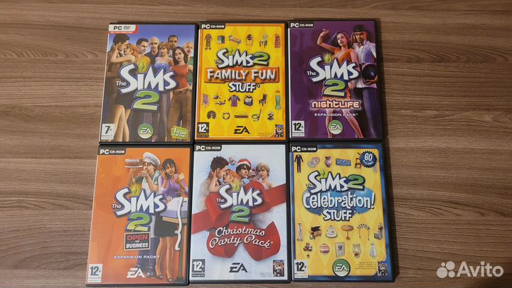 Диски с игрой The Sims 2