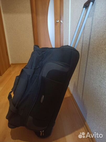 Сумка дорожная на колесах с выдвижной ручкой