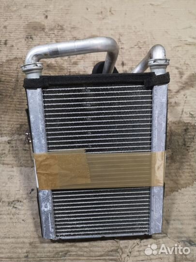 Радиатор печки 87107-52010 на Toyota Probox NCP51V