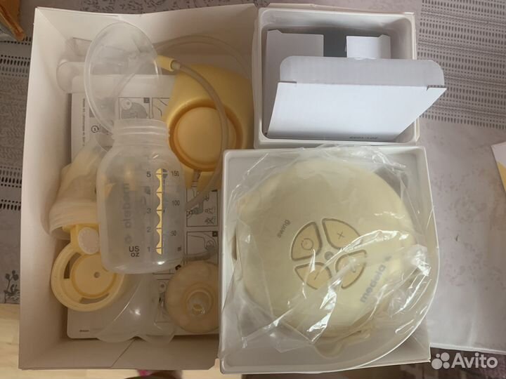 Молокоотсос medela электрический