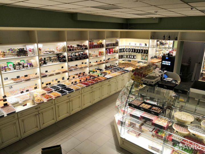 Продавец сухофруктов и сладостей