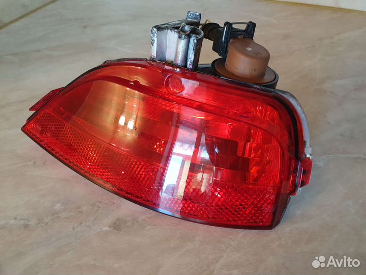 Оригинал фонарь противотуманный левый