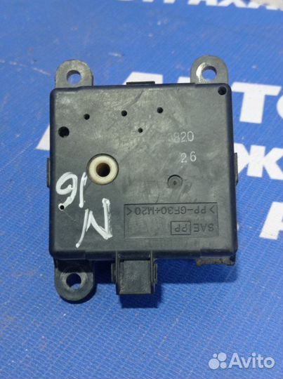Моторчик заслонок отопителя Nissan Almera N16