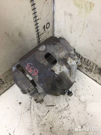 Суппорт передний левый Kia Sportage