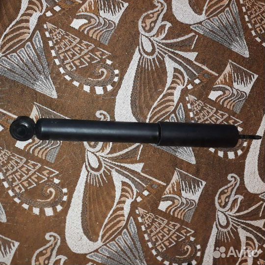 Задний амортизатор Mitsubishi Pojero