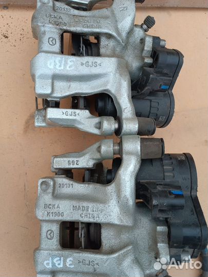 Тормозной суппорт задний Mazda 3BP.оригинал