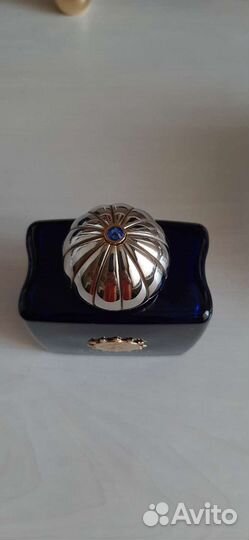 Пустые флакон из под парфюма и банка из под крема