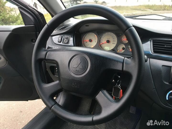 Оплетка (Обшивка) руля дорестайл Лансер 9