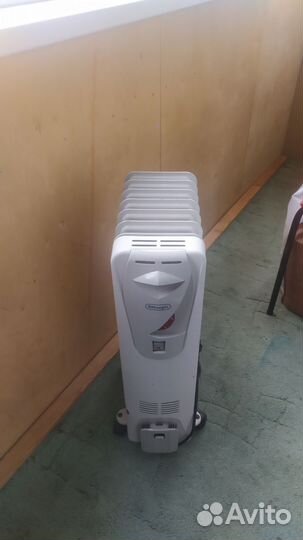 Масляный обогреватель Delonghi
