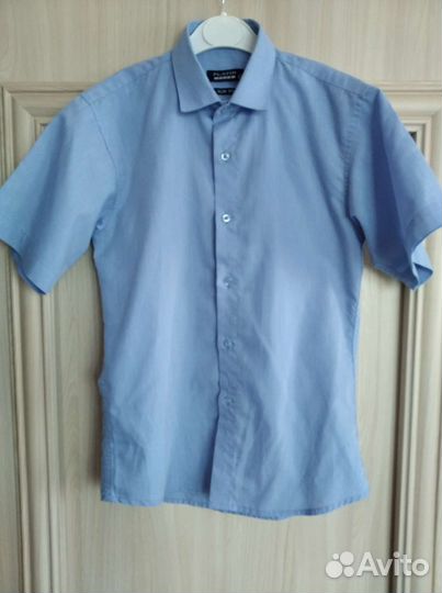 Рубашка на мальчика голубая р140