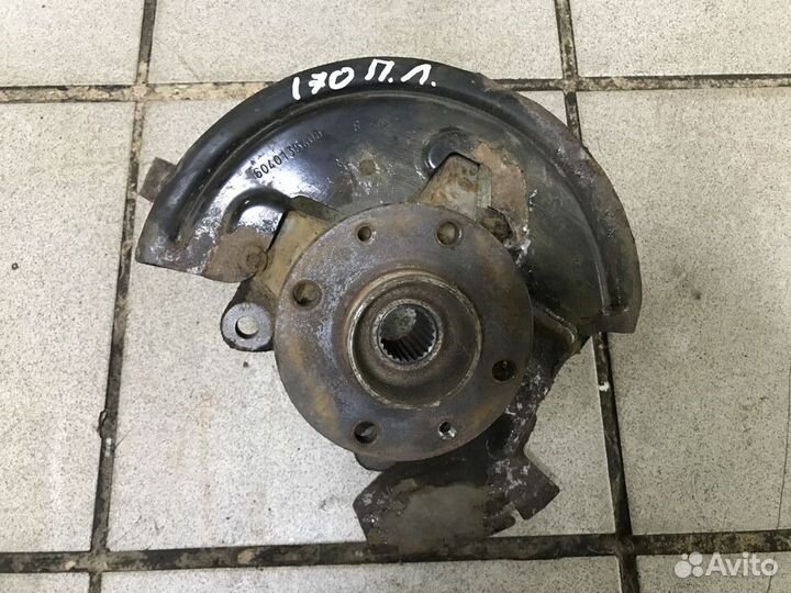 Поворотный кулак левый Nissan Almera G15