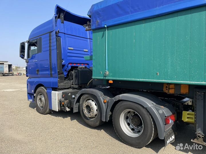 MAN TGX 26.480 с полуприцепом, 2012