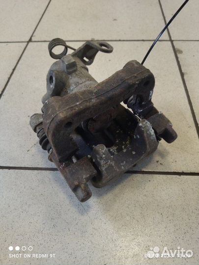 Суппорт тормозной задний правый Peugeot 308