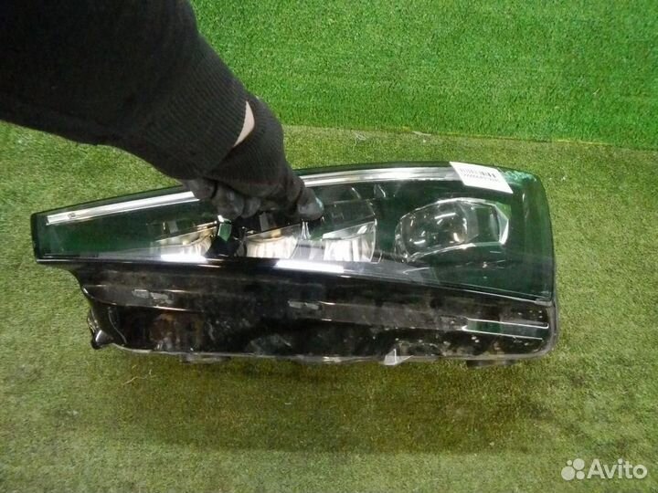 Фара левая Skoda Rapid
