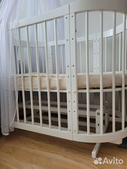 Детская кроватка трансформер с маятником овальная