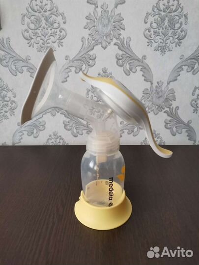 Молокоотсос medela