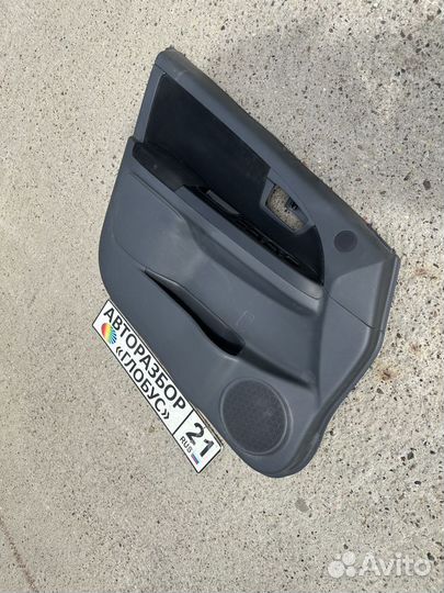 Обшивка двери передняя левая suzuki sx4