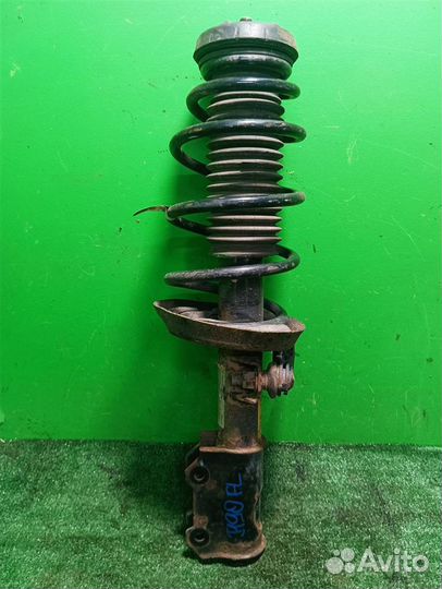 Стойка амортизатора передняя левая Chevrolet Cruz