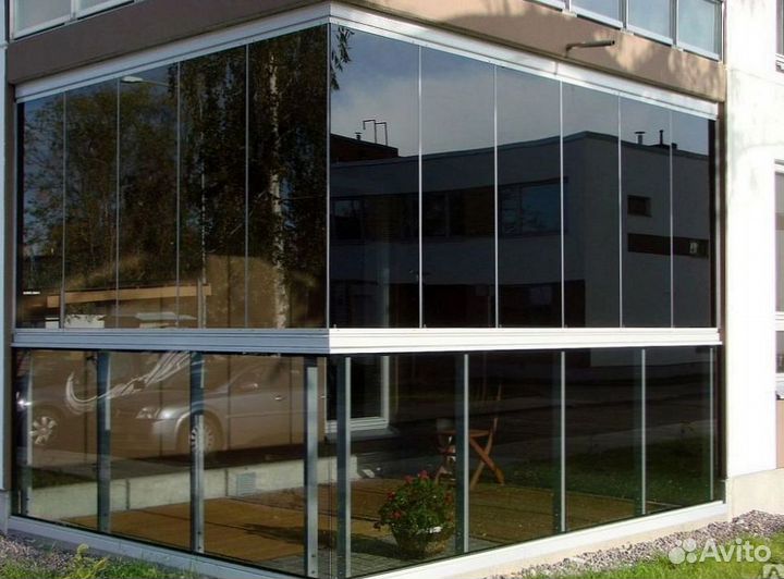 Безрамное раздвижное остекление