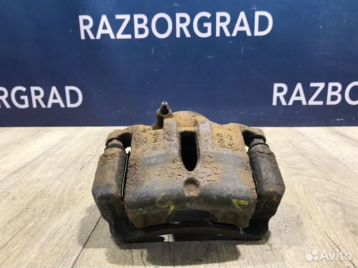 Суппорт передний правый Kia Sportage 3 2.0 G4KD