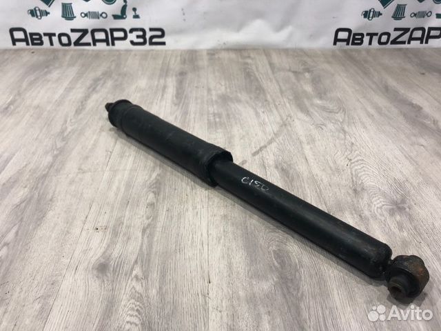 Амортизатор задний левый Toyota Corolla E150 2006