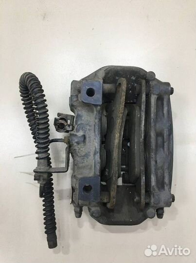 Суппорт задний левый Volkswagen Touareg