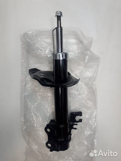 Передние стойки ниссан амортизатор