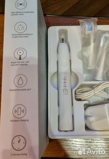 Электрическая зубная щетка