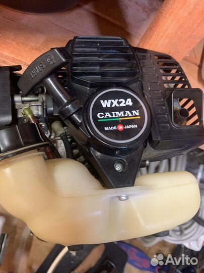 Бензокоса caiman WX24