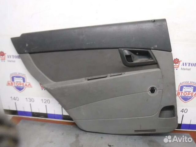 Обшивка двери задняя левая Лада Приора 21126 2011
