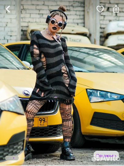 Рваный свитер