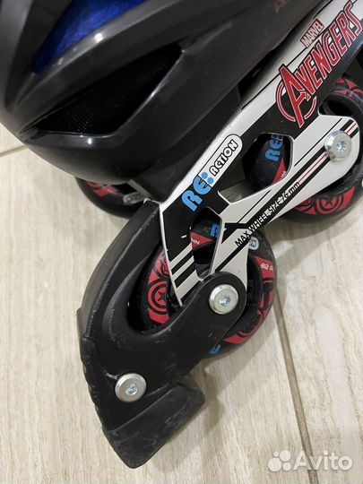 Роликовые коньки