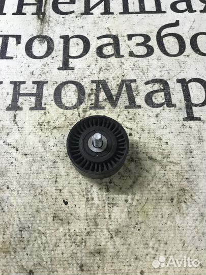 Ролик руч.ремня с кронштейном Land Rover Freelande