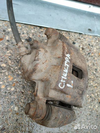 Суппорт тормозной передний левый Kia Spectra S6D