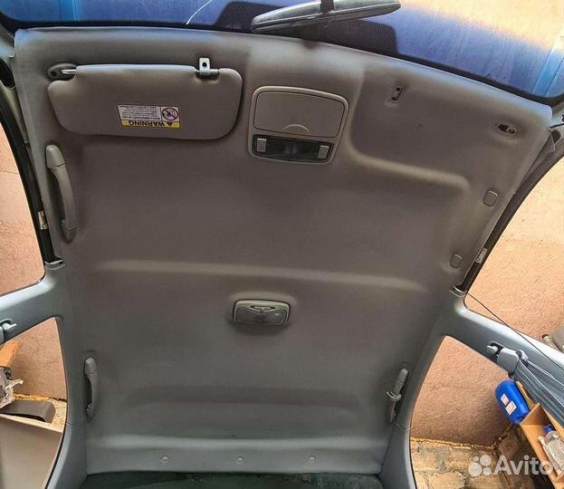 Обшивка потолка (потолок) Kia Spectra