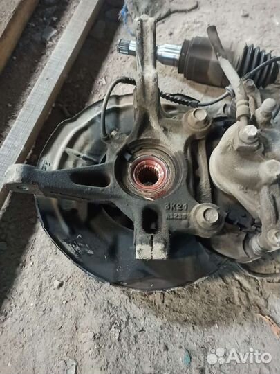 Кулак поворотный левый Chevrolet Aveo T300