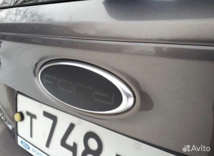Наклейки на эмблемы черные Ford Focus